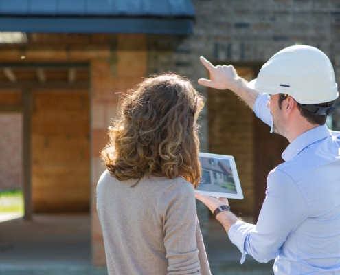 construction project manager using tablet to view project